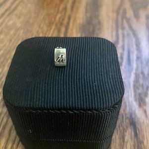 Tara’s Diary “M” charm with trinity knot